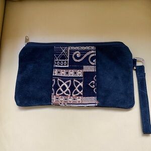 Casual suede clutch bag.